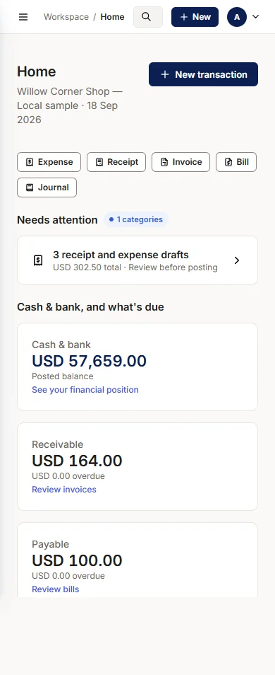 The same Home screen on a phone: drafts to review, USD 57,659.00 in cash and bank, USD 164.00 receivable and USD 100.00 payable.